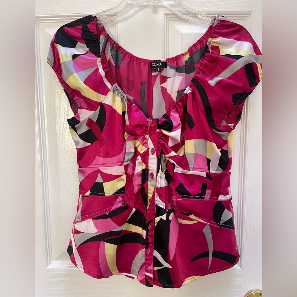 XOXO Blouse, Size Large
Used in excellent condition.